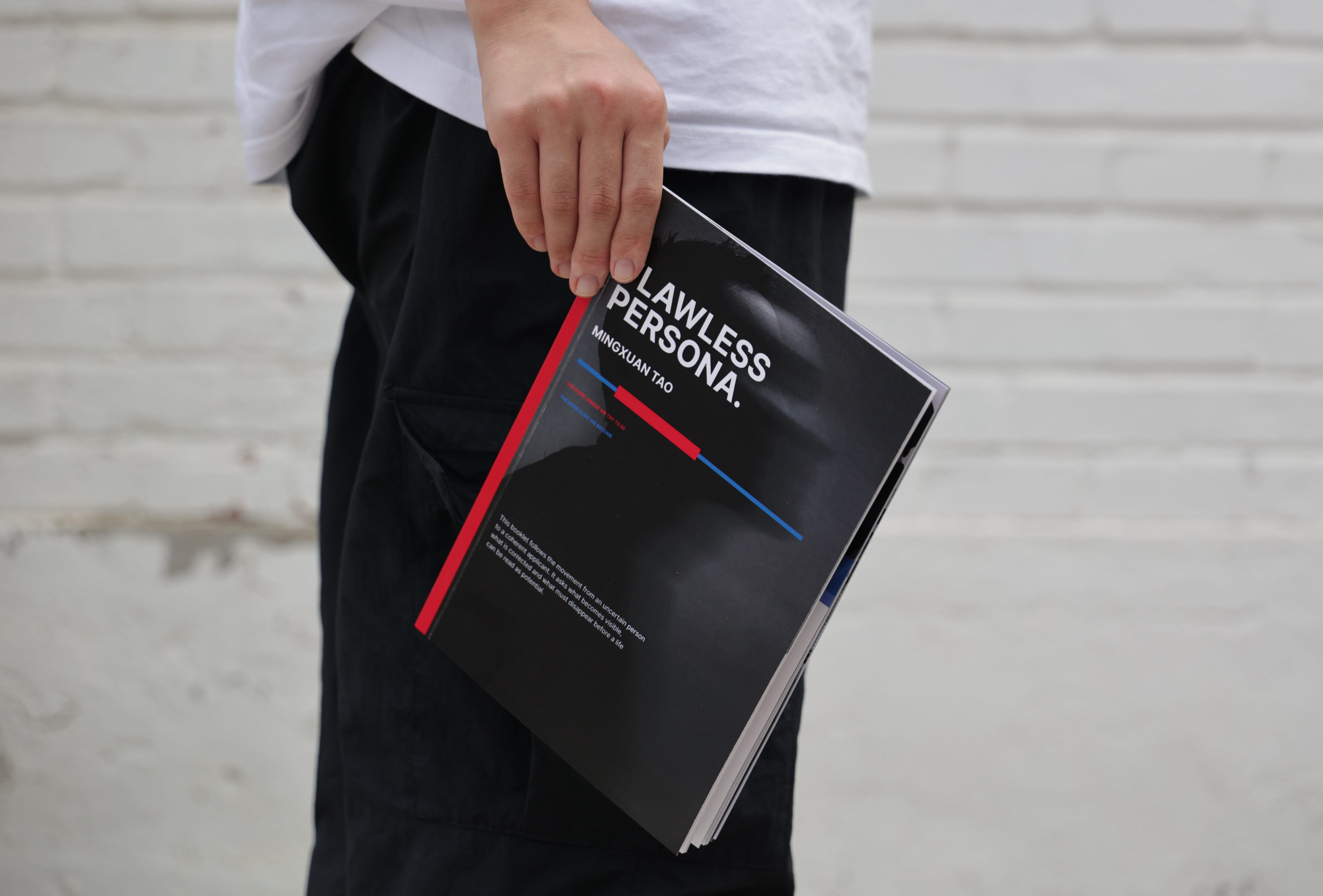 Flawless Persona booklet carried outdoors