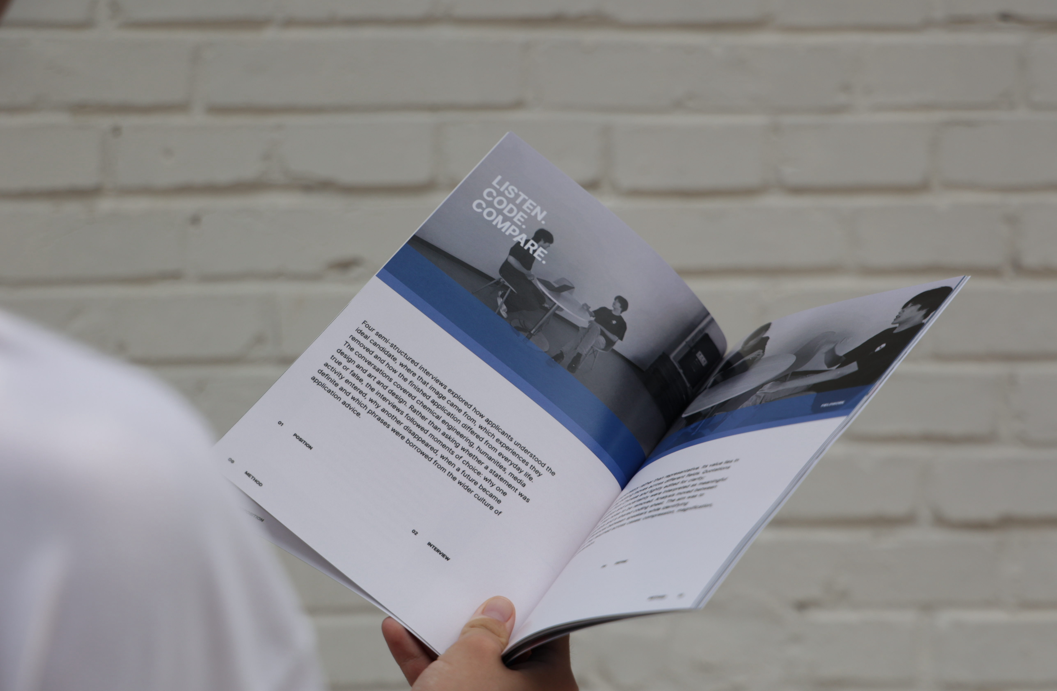 Reader viewing an interior Flawless Persona spread