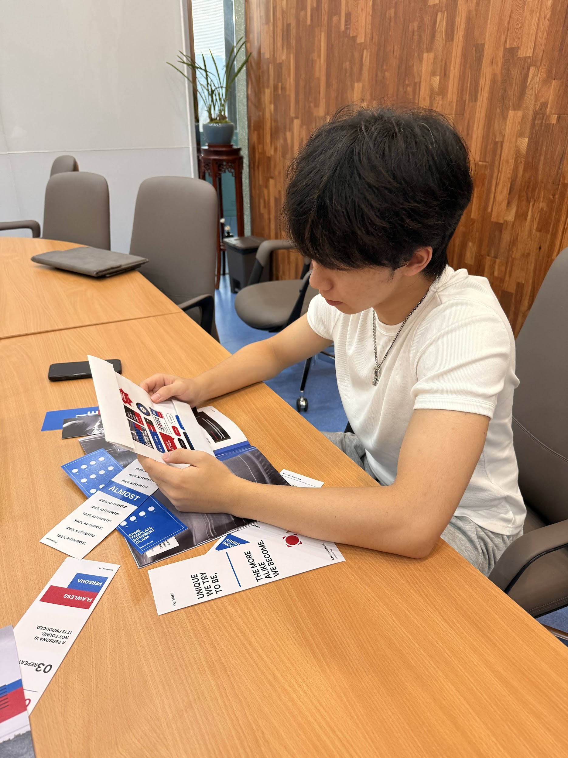 Viewer arranging Flawless Persona printed stickers
